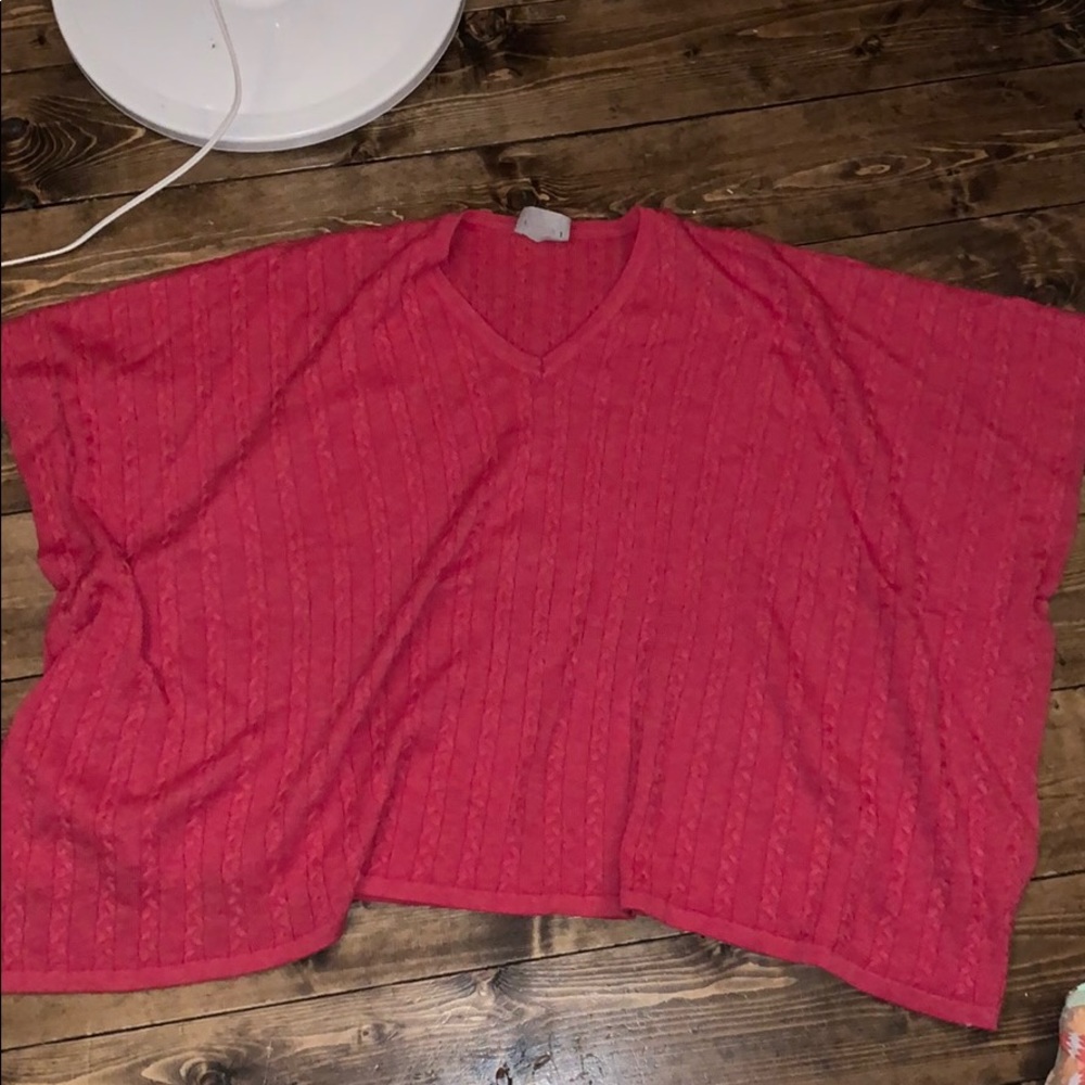 red sweater/poncho